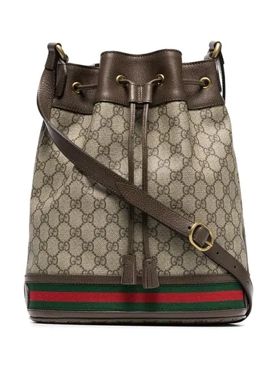 Shop Gucci Gg Logo Bucket Bag In Brown