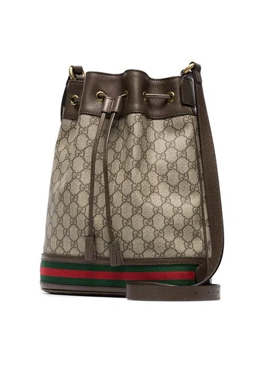 Shop Gucci Gg Logo Bucket Bag In Brown