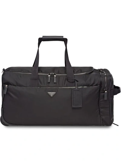 Shop Prada Nylon And Saffiano Leather Wheeled Carry-on In Black