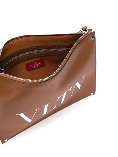 Shop Valentino Garavani Vltn 'rockstud' Clutch In Brown