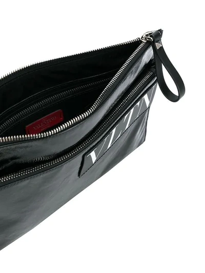 Shop Valentino Vltn Clutch Bag In Black