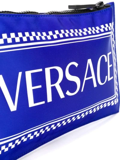 Shop Versace Logo Print Clutch In Blue