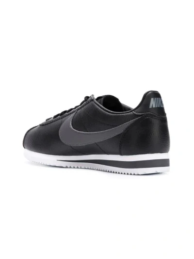 Shop Nike Cortez Sneakers In Black