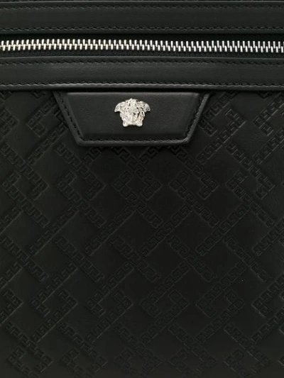 Shop Versace Textured Medusa Clutch In Black