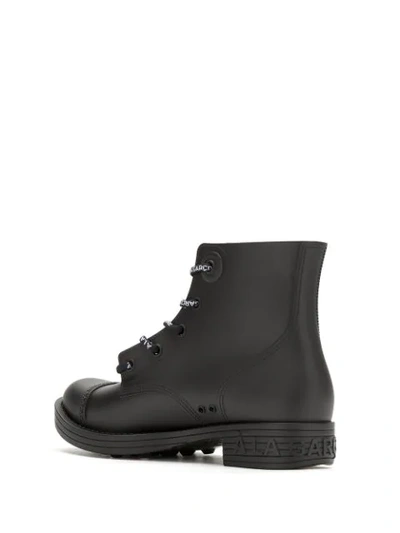 Shop À La Garçonne + Melissa Combat Boots In Black