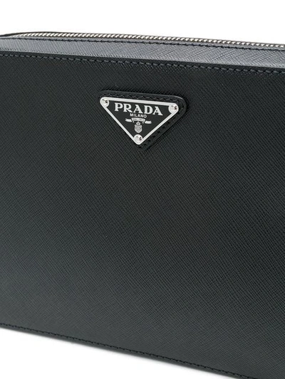 Shop Prada Logo Plaque Zipped Clutch In Black