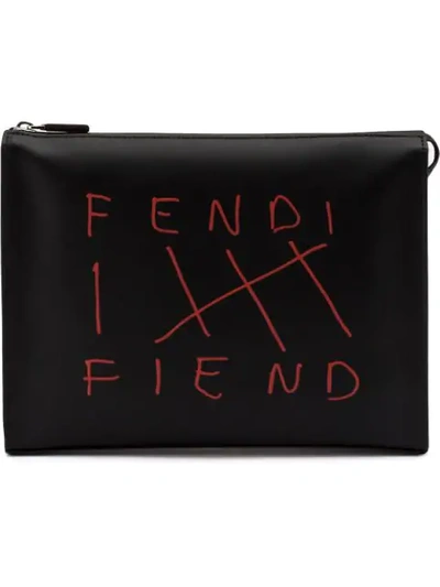 Shop Fendi Logo Embroidered Clutch In F0p0n Nero+rosso+palladio
