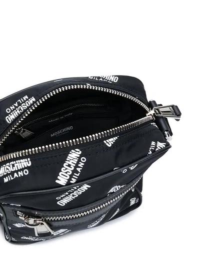 Shop Moschino Monogram Messenger Bag In Black