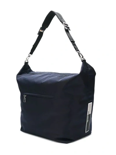 Shop Prada Rubber Logo Patch Shoulder Bag In Blue