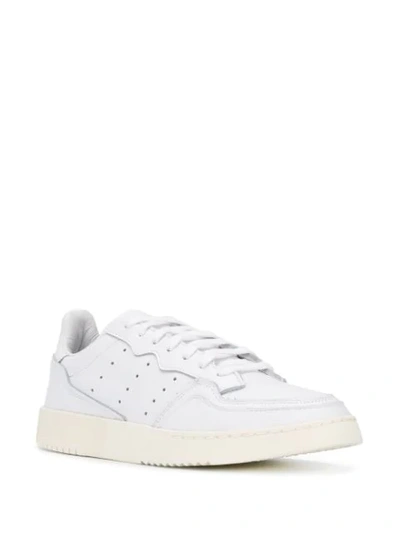 Shop Adidas Originals Supercourt Home Of Classics Collection Sneakers In White