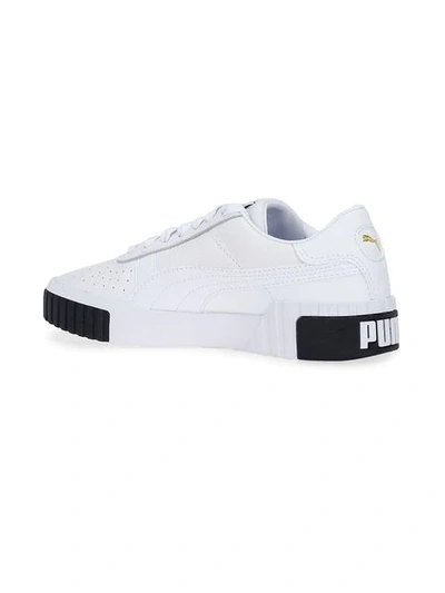 Shop Puma Cali Sneakers In White