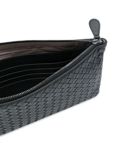 woven zipped clutch