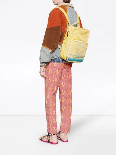 Shop Gucci Medium Backpack With Interlocking G Print In Yellow