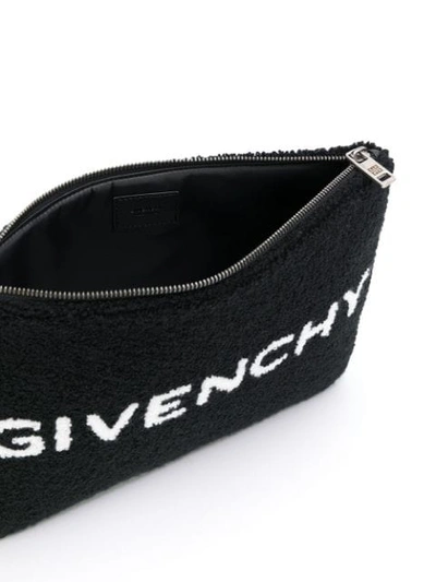 Shop Givenchy Logo Clutch Bag In Black