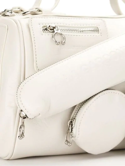 Shop À La Garçonne Multi Pocket Shoulder Bag In White