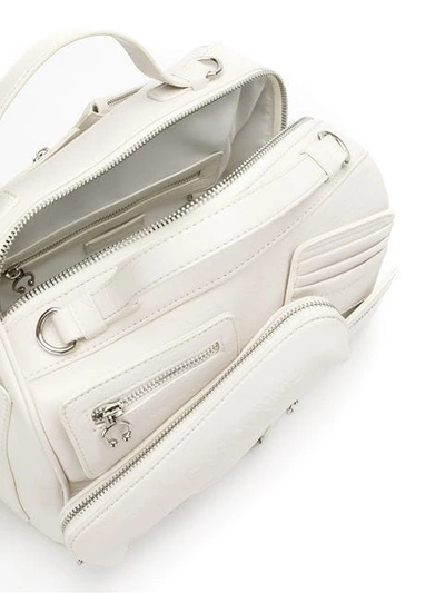 Shop À La Garçonne Multi Pocket Shoulder Bag In White