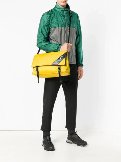 Shop Prada Logo Messenger Bag In F0c5k Giallo+nero