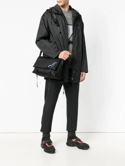 Shop Prada Logo Crossbody Bag In F0002 Black