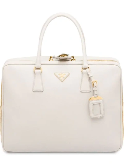 Shop Prada Saffiano Logo Suitcase In White
