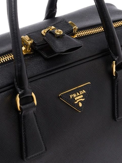 Shop Prada Saffiano Logo Suitcase In Black