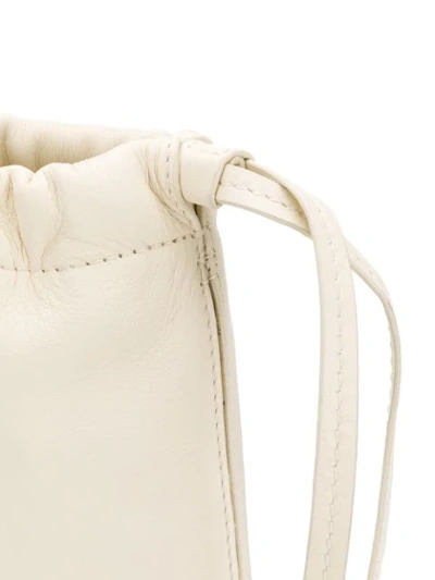 Shop Bonastre Drawstring Top Clutch In Neutrals