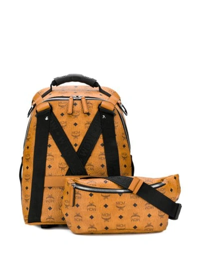 Shop Mcm Logo Textured Backpack In Brown