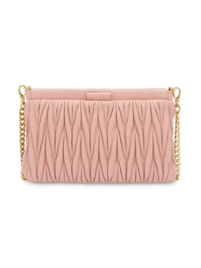 Shop Miu Miu Matelassé Clutch Bag In Pink