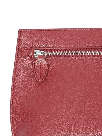 Shop Burberry Grainy Leather Wristlet Clutch In Red