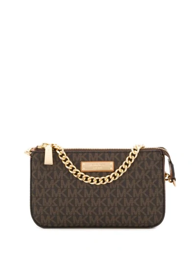 Shop Michael Michael Kors Logo Clutch Bag In Brown