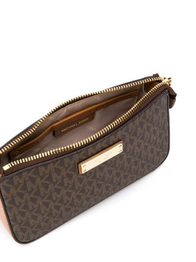 Shop Michael Michael Kors Logo Clutch Bag In Brown