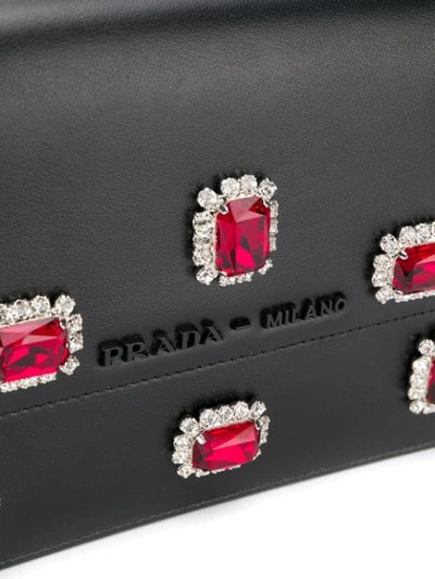 Shop Prada Mini Bandoliera Clutch Bag In Black