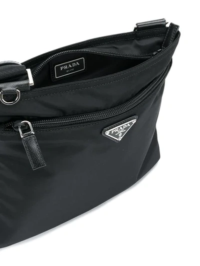 Shop Prada Logo Plaque Cross-body Bag In Black