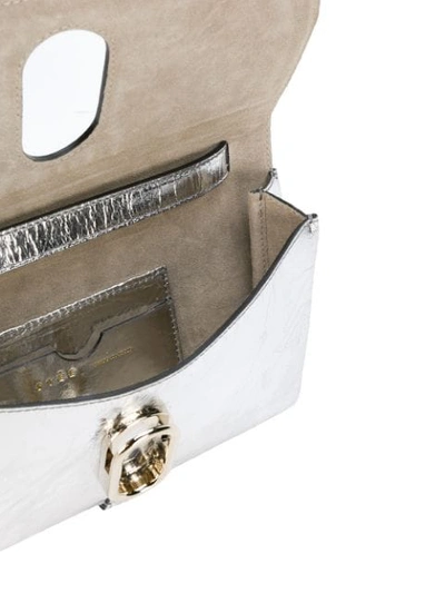Shop Stée Ring Buckle Crossbody Bag - Metallic