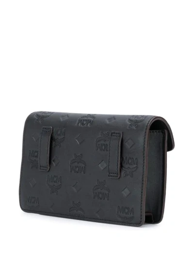 Shop Mcm Embossed Logo Belt Bag In Black