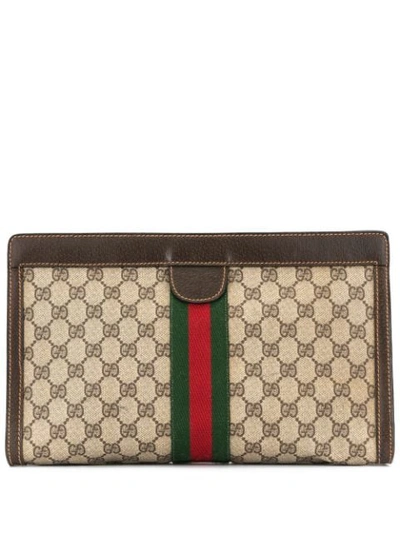 Shop Gucci Gg Supreme Clutch - Brown