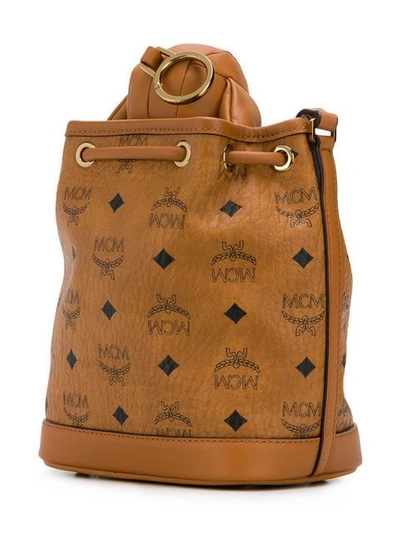 Shop Mcm Dog Bucket Bag In Brown