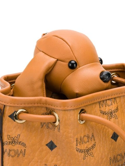 Shop Mcm Dog Bucket Bag In Brown