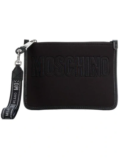 Shop Moschino Logo Zipped Clutch In Black
