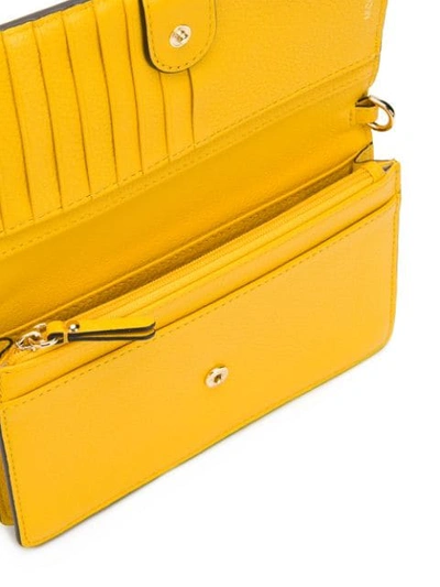 Shop Michael Michael Kors Floral Embellished Crossbody - Yellow