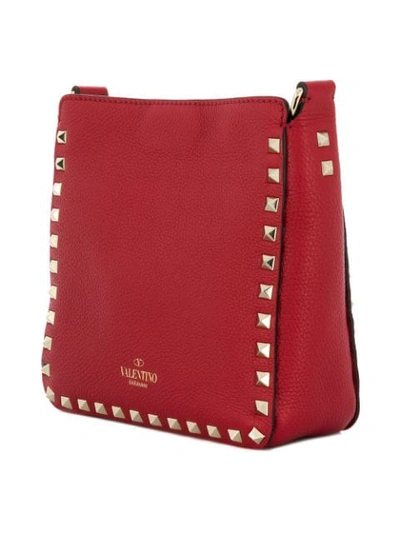 Shop Valentino Garavani Rockstud Messenger Bag In Red