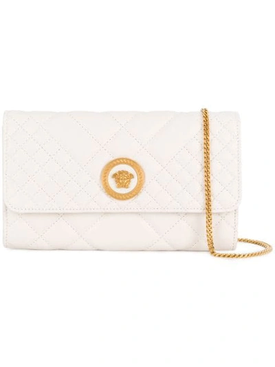 Shop Versace Quilted Medusa Clutch Bag In White
