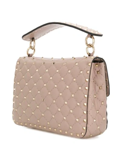 Shop Valentino Garavani Rocktud Spike Butterfly Shoulder Bag In Pink