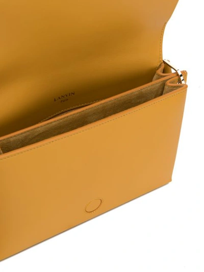 Shop Lanvin Front Pouch Shoulder Bag In Yellow