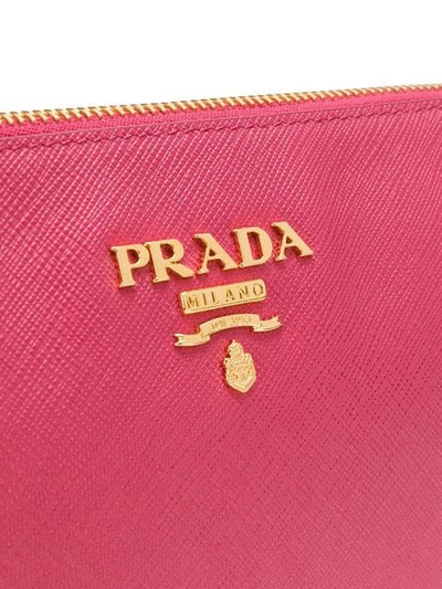 Shop Prada Logo Plaque Clutch Bag In Pink