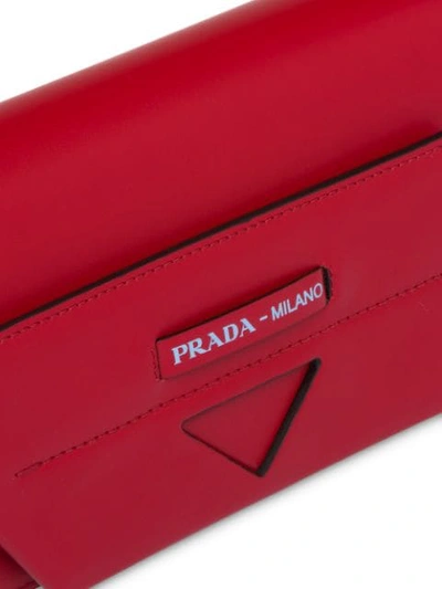 Shop Prada Manuelle Shoulder Bag In Red