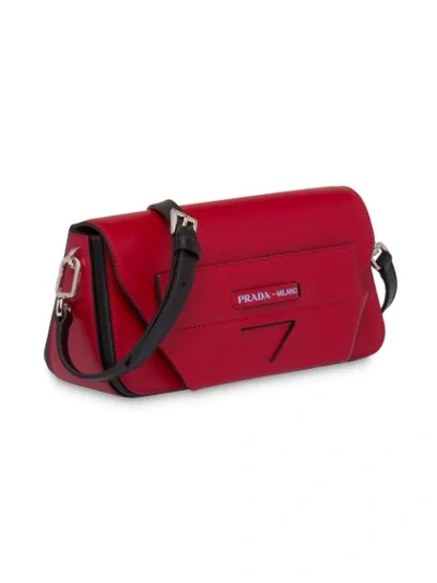 Shop Prada Manuelle Shoulder Bag In Red