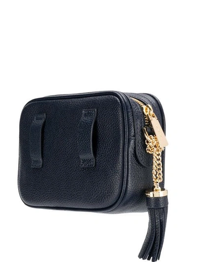 Shop Michael Michael Kors Tassel Belt Bag - Blue