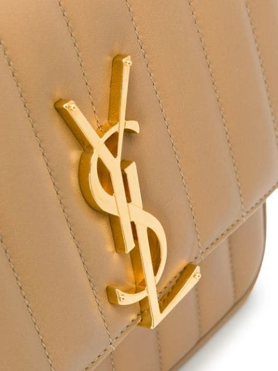 Shop Saint Laurent Quilted Monogram Shoulder Bag In Brown