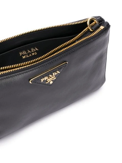 Shop Prada Logo Plaque Clutch Bag - Black