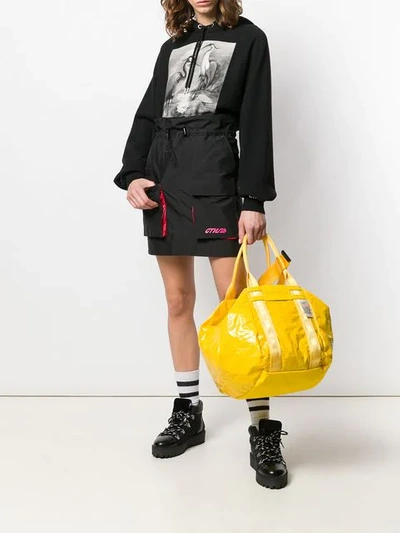 Shop Diesel Shiny Hobo Bag In Yellow